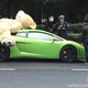 Illustration for article titled Chinese Lamborghini Owner Reportedly Fined For Driving With A Giant Stuffed Bear On His Roof